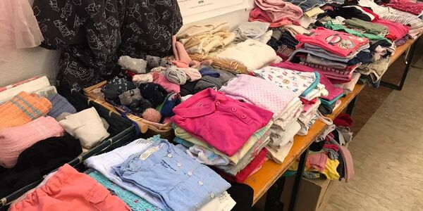 Immagine decorativa per il contenuto Vestiti per bambini/e